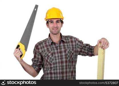 Carpenter holding hand saw