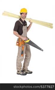 carpenter holding saw and planks