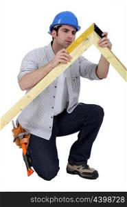 Carpenter making a frame