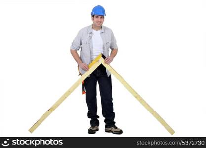 Carpenter making a wooden frame
