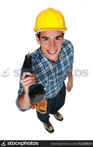 Carpenter stood with cordless drill
