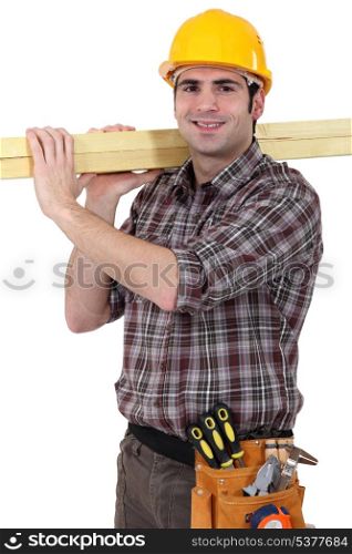 Carpenter transporting wood