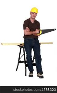 Carpenter with a handsaw