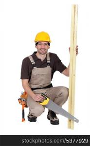 Carpenter with hand saw