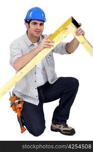 Carpenter with wood frame