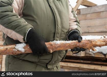 Carpenter working at sawmill, closeup photo