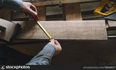 carpentry concept with man measuring. Beautiful photo. carpentry concept with man measuring