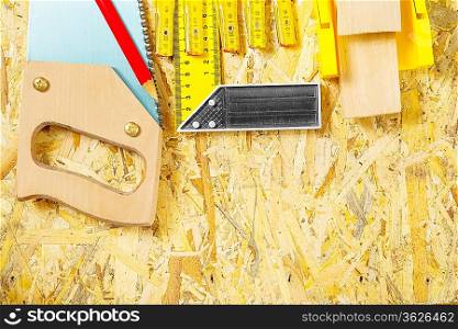 carpentry tool set on plywood board
