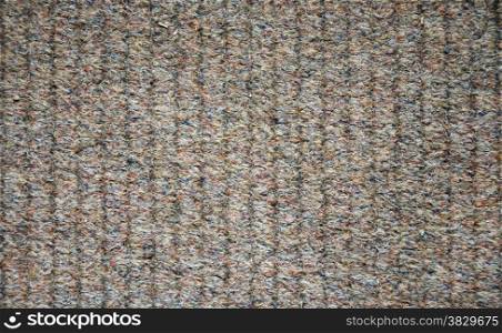 carpet lines as a grey brown background or wallpaper