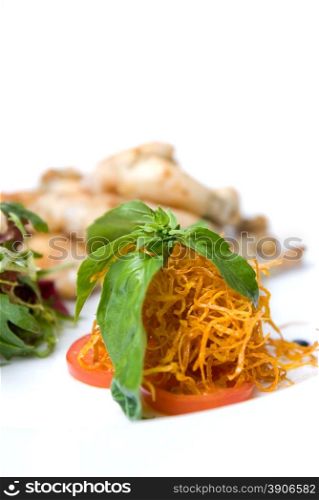 carrot and tomato with green leaves