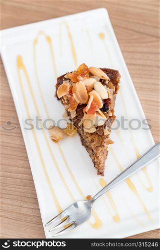 Carrot cake dessert pastry bread with fruit topping