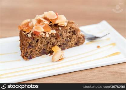 Carrot cake dessert pastry bread with fruit topping