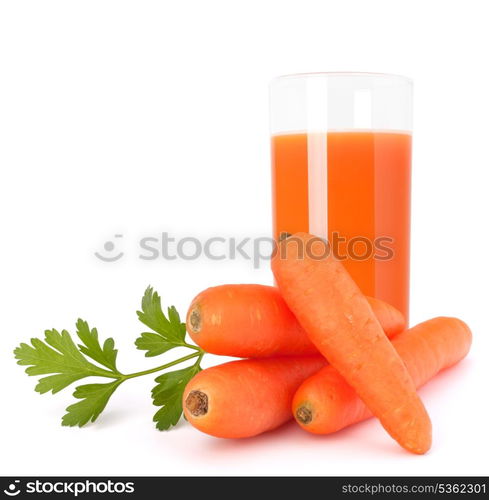 Carrot juice glass and carrot tubers isolated on white background