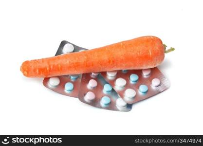carrots and packing with vitamins isolated on a white background