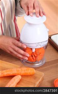Carrots in electric blender