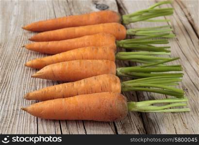 carrots on old wooden table