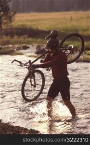Carrying a Bike Across a River