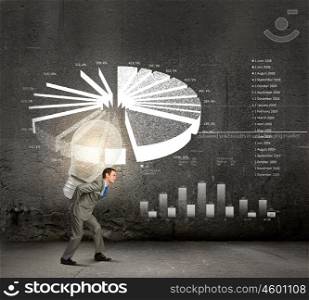 Carrying out an idea. Young businessman carrying light bulb on back