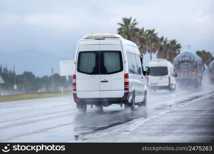 Cars driving along a wet highway in rainy weather in Turkey