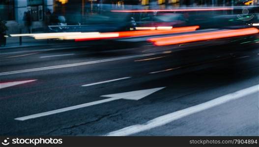 Cars in a Blurred City Scene