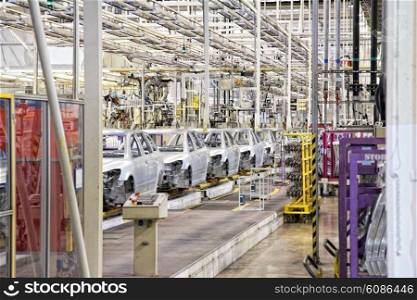 cars in a row at car plant
