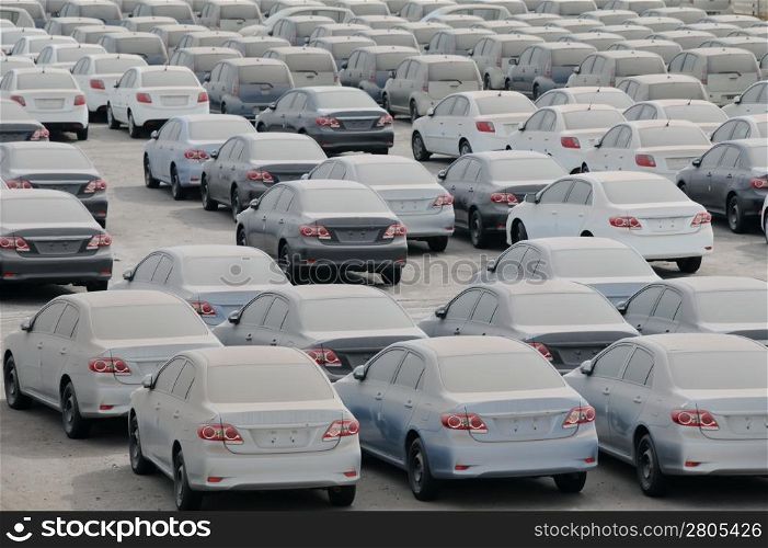 Cars in the port of Eilat in Israel covered with dust and desert sand