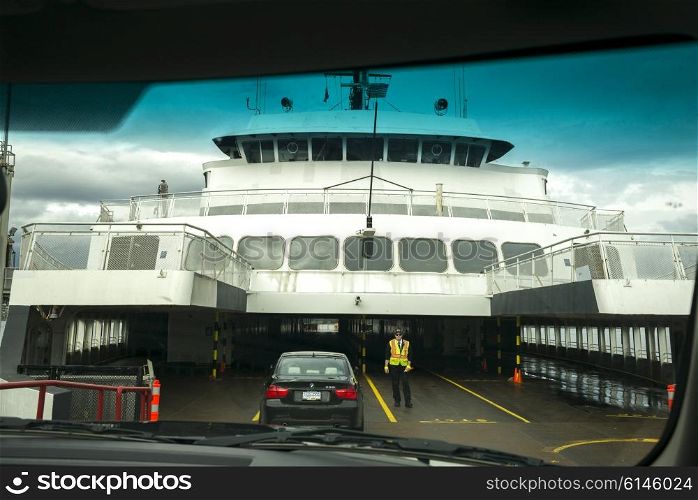 Cars loading onto a ferry, British Columbia, Canada