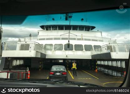 Cars loading onto a ferry, British Columbia, Canada