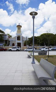 Cars moving on the road in front of a church, Luquillo, Puerto Rico