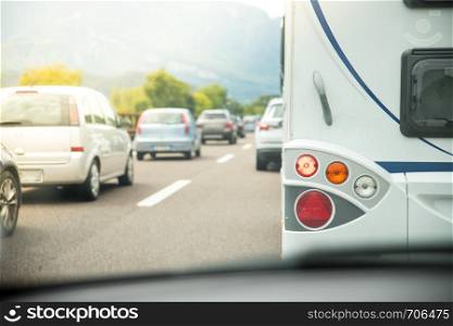 Cars on a highway, traffic jam in summer season
