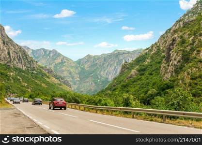 Cars on the road in mountains of Montenegro. Cars on the road