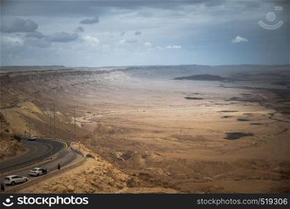 cars on the road in the negev desert in israel. negev desert in israel