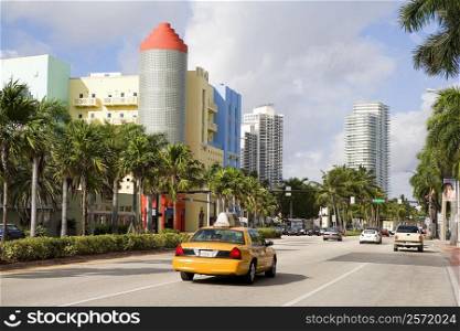 Cars on the road with buildings in the background, South Beach, Miami Beach, Florida, USA