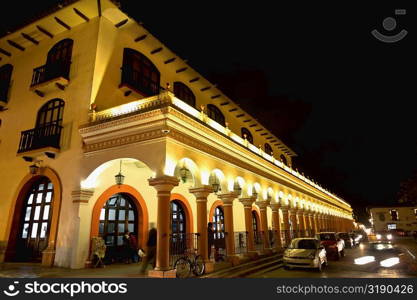 Cars parked in front of a building, San Cristobal De Las Casas, Chiapas, Mexico