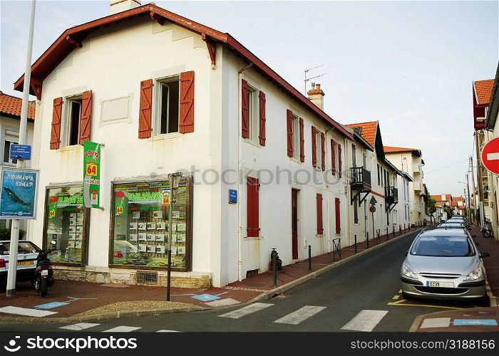 Cars parked in front of houses in a street, Rue Paul Bert, Biarritz, France