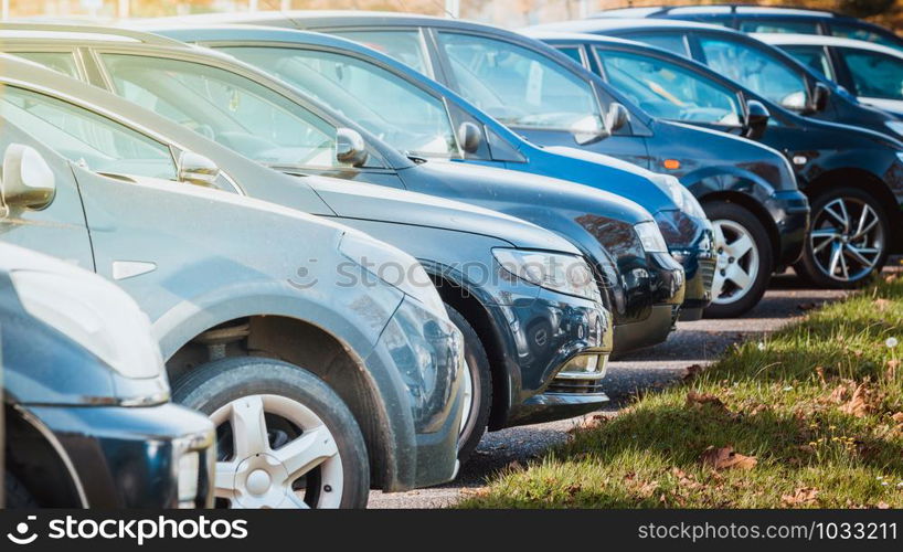 cars row parked at a car dealership stock