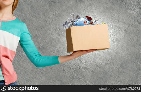 Carton box. Close up of woman hand holding carton box