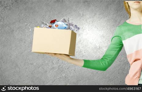 Carton box. Close up of woman hand holding carton box