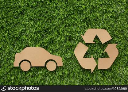 cartoon car recycle sign grass. High resolution photo. cartoon car recycle sign grass. High quality photo