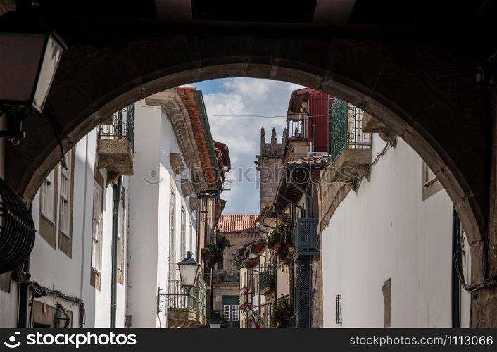Carved balconies on traditional houses near the main square in Guimaraes. Balconies of traditional houses in Guimaraes in Portugal