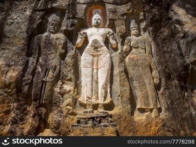 Carved Buddhist Sculpture Rock in Buduruvagala  UNESCO World Heritage Site ,  Sri Lanka, South Asia