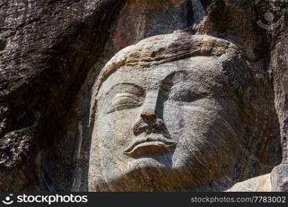 Carved Buddhist Sculpture Rock in Buduruvagala  UNESCO World Heritage Site ,  Sri Lanka, South Asia