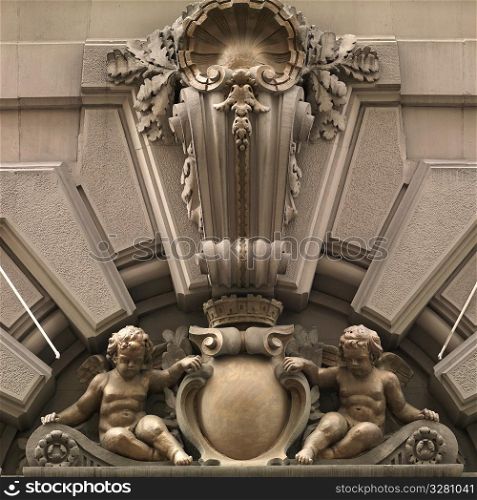 Carved churebs on facade of a building in Manhattan, New York City, U.S.A.