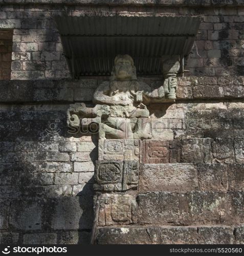Carved figure at an archaeological site, Copan, Copan Ruinas, Copan Department, Honduras