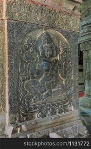 Carved sandstone figure of Hindu god