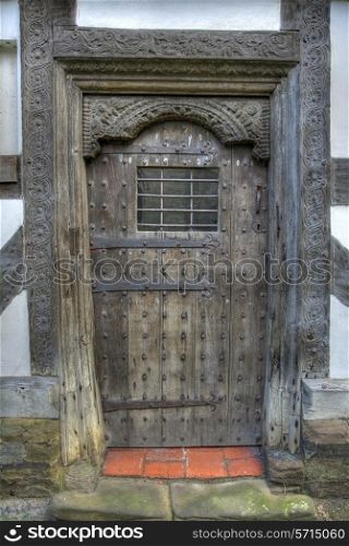 Carved Tudor door, Ludlow, Shropshire, England.