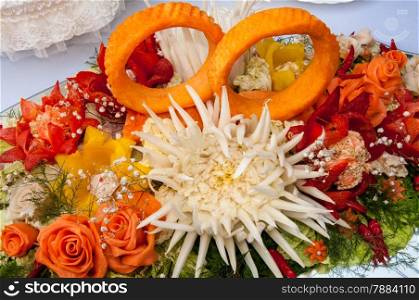 Carving is the art of cutting vegetables and fruits