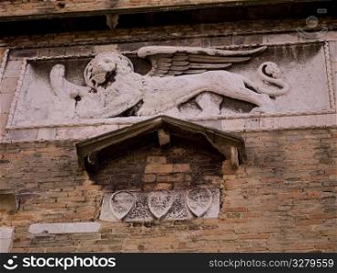 Carving of a winged lion in Venice
