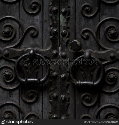 Carvings on exterior door of a building in Manhattan, New York City, U.S.A.