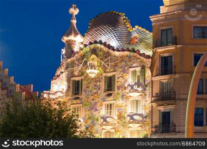 Casa Batllo at night, Barcelona, Spain. Barcelona, Catalonia, Spain - July 7, 2017: Casa Batllo, Casa dels ossos or House of Bones, masterpiece of Antoni Gaudi during evening blue hour